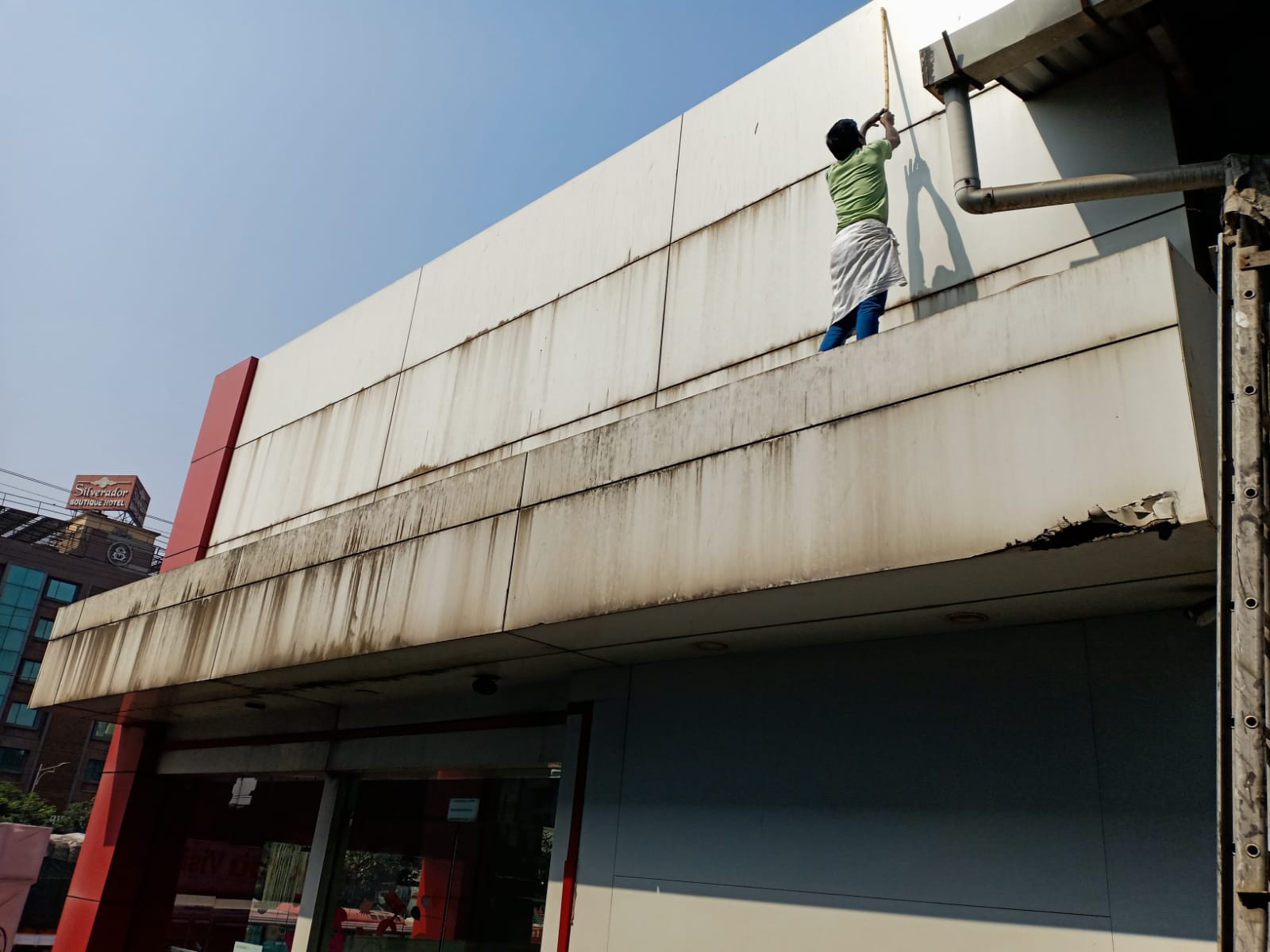 Showroom facade panels before washing